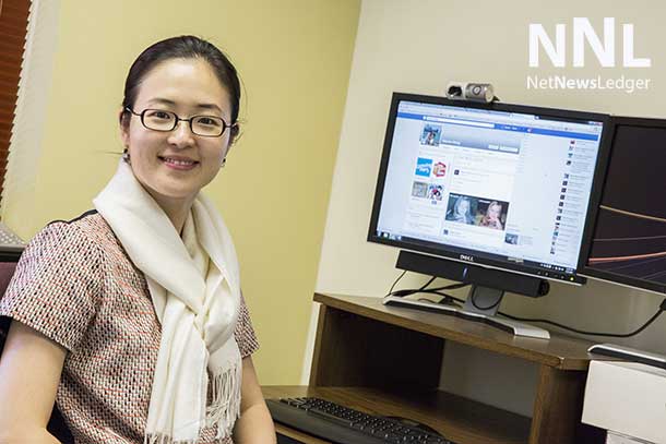 Associate Professor  Song is researching the impact of Facebook on social interaction in North America.