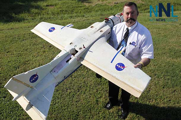 NASA researcher Mike Logan plans to use this small unmanned aerial vehicle to check for fires at a Virginia-North Carolina wildlife refuge as part of an agreement with the U.S. Fish and Wildlife Service Image Credit: NASA Langley/David C. Bowman