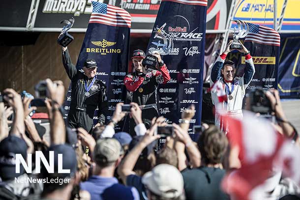 Nigel Lamb of Great Britain (L), Pete McLeod of Canada (C) and Matthias Dolderer (R) celebrate during the Award Ceremony on the seventh stage of the Red Bull Air Race World Championship at the Las Vegas Motor Speedway in Las Vegas, Nevada, United States on October 12, 2014. - Predrag Vuckovic/Red Bull Content Pool