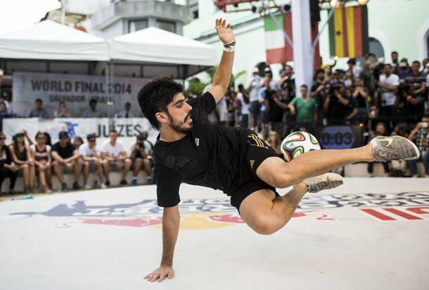 Freestyle soccer athlete Pedro Oliveira of Brazil competes during the Red Bull Street Style world final 2014 in Salvador, Brazil on November 16th, 2014. Freestyle soccer athletes from 44 nations participate at the world final.