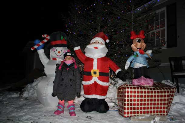 Smiles and bright lights are a part of Attawapiskat Christmas 2014 - Photo by Rosiewoman Cree