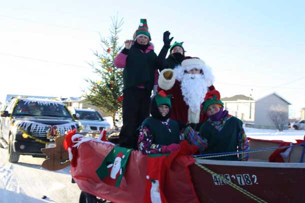 Santa visiting Attawapiskat for the 2014 Christmas Parade. Photo by Rosiewoman Cree