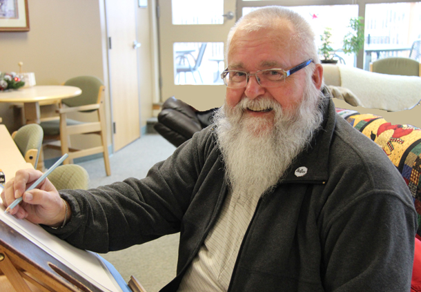 Caricaturist John Tuokko is a long-time volunteer at TBaytel Tamarack House, a home away from home for cancer patients from outside Thunder Bay coming for treatment at the Cancer Centre.