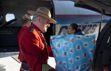 Unloading Toys in Landsdowne House RCMP S/Sgt. Normand Roy