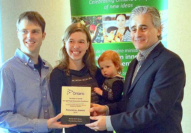 Award recipients Dave Challen and Beth Kuiper, Owners of Boreal Birch Syrup in Murillo, with their daughter Paige and MPP Mauro.