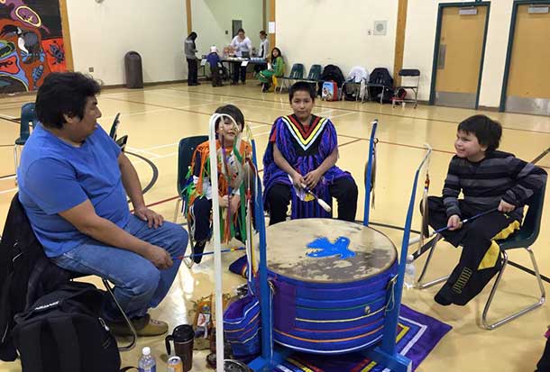 Drumming in Neskantaga First Nation at Pow Wow