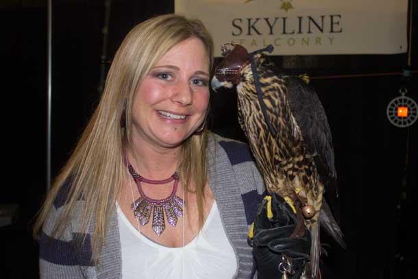 Kym shows off a beautiful Falcon at the Central Canada Outdoor & Recreation Show