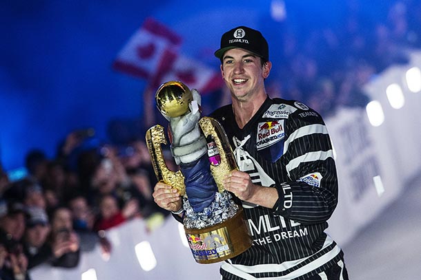 Scott Croxall of Canada celebrates during the Award Ceremony of the fourth stage of Red Bull Crashed Ice, the Ice Cross Downhill World Championship in Edmonton, Canada on March 14, 2015.