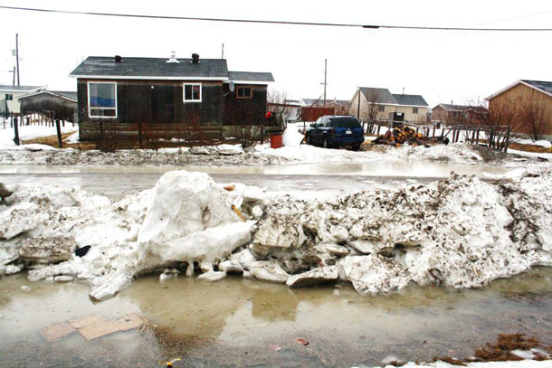 Warm weather is melting away the winter snow and river ice. Attawapiskat worries about possible flooding - Photo by Rosiewoman Cree