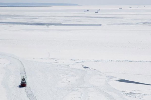 The Canadian Coast Guard Cutter Samuel Risley continues ice breaking operations on eastern Lake Superior, creating tracks that will enable 18 vessels currently being staged to continue transiting to and from the lower Great Lakes, April 7, 2015. Ongoing ice breaking operations with U.S. Coast Guard ice breakers are part of the Spring Breakout phase of Operation Taconite. (Photo courtesy of Canadian Coast Guard)