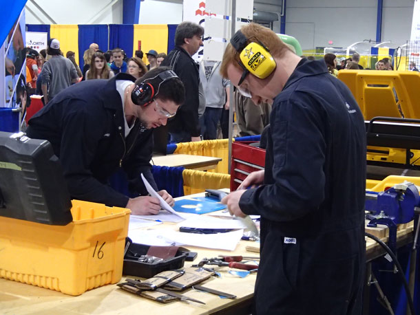 Silver Medalist Don Mills (left) and Fellow Student Brent Berube Work on their Sheet Metal Projects during the Competition