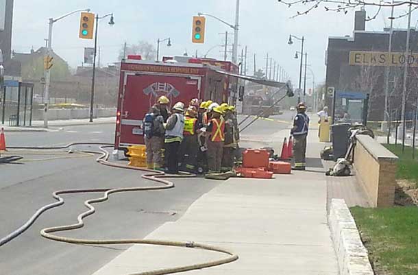 Fire Fighters prepare to go remove the suspicious package from the Court House