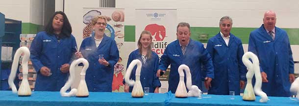 Ontario Premier Kathleen Wynne, Ministers Michael Gravelle and Bill Mauro, and Thunder Bay Mayor Keith Hobbs join in with students to perform a science demo in celebration of Science North's 5th Anniversary in Thunder Bay.