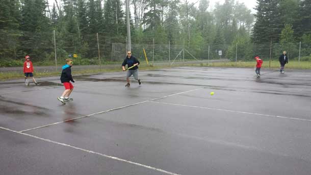 Playing tennis at Camp Quality