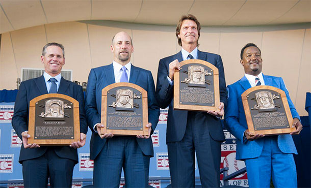 The Hall of Fame Class of 2015 -- Craig Biggio, Randy Johnson, Pedro Martínez and John Smoltz -- hold their new plaques at the Induction Ceremony on Sunday at the Clark Sports Center in Cooperstown. (Milo Stewart, Jr. / National Baseball Hall of Fame)