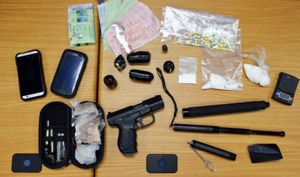 Thunder Bay Police Image showing weapons, cash and drugs seized in drug bust in Westfort