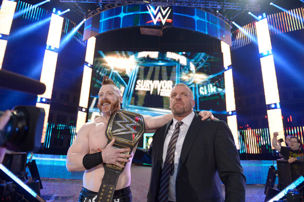 HHH wasted no time in celebrating with newly crowned WWE® Champion Sheamus.