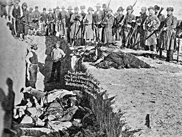 Victims of Wounded Knee Massacre buried in a mass grave