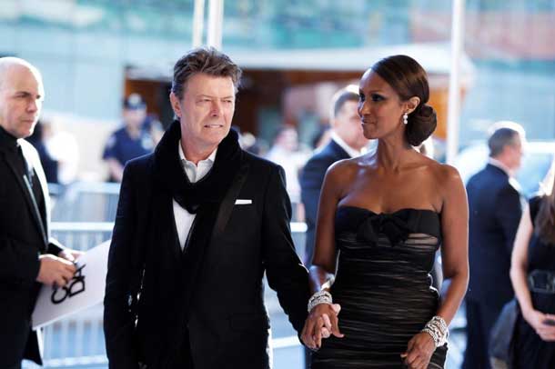 Singer David Bowie arrives with his wife Iman to attend the Council of Fashion Designers of America (CFDA) fashion awards in New York June 7, 2010. REUTERS/Lucas Jackson