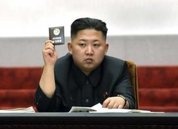 North Korean leader Kim Jong-Un holds up his ballot during the fifth session of the 12th Supreme People's Assembly of North Korea at the Mansudae Assembly Hall in Pyongyang April 13, 2012, in this file picture released by the North's KCNA on April 14, 2012.  REUTERS/KCNA/Files