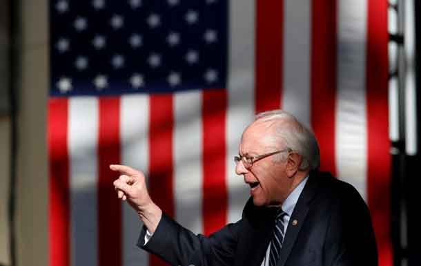 Bernie Sanders speaks to supporters after rival candidate Hillary Clinton was projected as the winner in the Nevada Democratic caucuses as he appears at a rally in Henderson. REUTERS/Jim Young