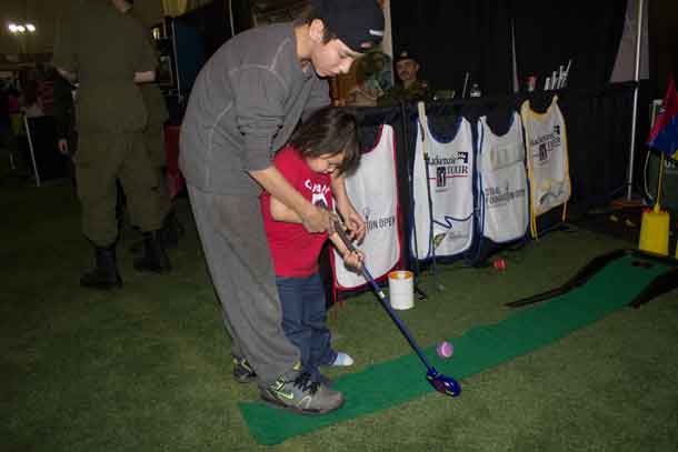 AT the PGA TOUR Canada Staal Foundation Open Booth the kids tried their hand at a little golf.