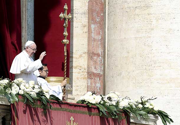 Pope Francis delivers the Urbi et Orbi benediction at the end of the Easter Mass in Saint Peter's Square at the Vatican March 27, 2016. REUTERS/Alessandro Bianchi