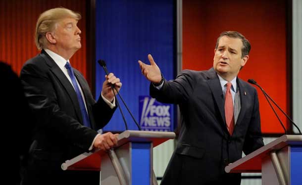 Ted Cruz gestures over at rival candidate Donald Trump at the Republican presidential candidates debate in Detroit, Michigan, March 3, 2016. REUTERS/Jim Young