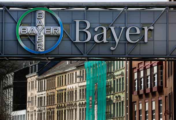 The logo of Bayer AG is pictured at the Bayer Healthcare subgroup production plant in Wuppertal February 24, 2014. REUTERS/Ina Fassbender/File Photo