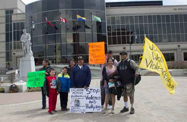 Walkers honouring Josh Nanokeesic from Big Trout Lake . KI First Nation Completed their annual walk to raise awareness on bullying and violence today at City Hall in Thunder Bay