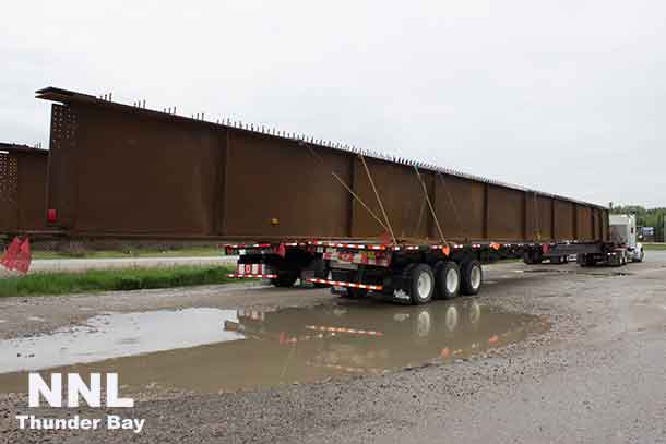 The Nipigon Bridge is continuing construction as girders for the bridge are headed to the construction site.