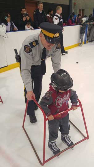 Under the watchful eye of an RCMP officer the youth learn the basics