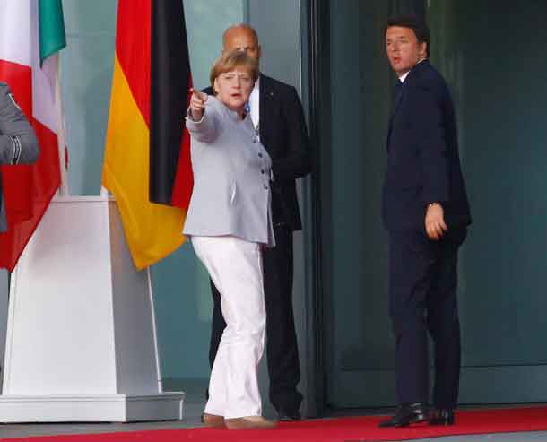 German Chancellor Angela Merkel and Italian Prime Minister Matteo Renzi (R) meet at the chancellery to discuss the outcome of the Brexit in Berlin, Germany, June 27, 2016. REUTERS/Hannibal Hanschke