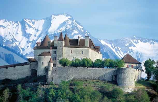 Switzerland. get natural. Gruyeres castle, built in the 11th century, with mount Vanil Noir (2398 m) in the background. Schweiz. ganz natuerlich. Das im 11. Jahrhunder erbaute Schloss Gruyeres mit dem Vanil Noir (2398 m) im Hintergrund. Suisse. tout naturellement. Chateau de Gruyeres, edifie au 11e siecle, avec au fond le Vanil Noir (2398 m). Copyright by: Switzerland Tourism By-Line: swiss-image.ch/Christof Sonderegger