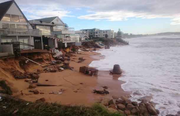Damaged homes along the foreshore of Sydney's Collaroy Beach, hit by powerful storms in early June. CREDIT Mitchell Harley/UNSW