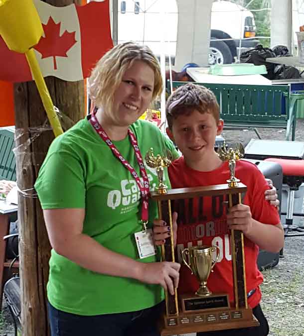 Ezekiel receiving the Quinten Spirit Award from Camp Quality Director Ashleigh