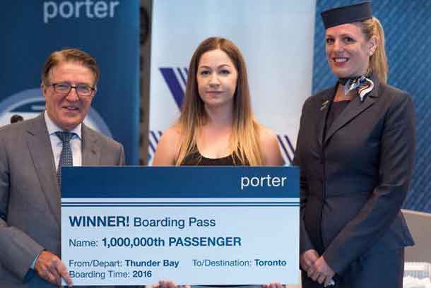 President and CEO of Porter Robert Deluce, Brittany Mascioli (1M Pax) and Flight Attendant Janice Hammond Photo Credit: Marc Gascoigne