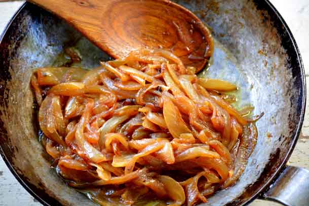 Onions caramelizing in the pan. Credit: Copyright 2016 Lynne Curry