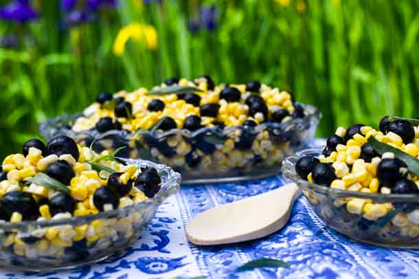Fresh Corn Salad With Blueberries and Tarragon. Raw and delicious, this is a fast salad bursting with flavor. Raw corn cut from the cob, fresh blueberries and plenty of fresh tarragon match up with sherry vinegar and olive oil for a small salad with giant tastes and textures. Credit: Copyright 2016 Tami Weiser