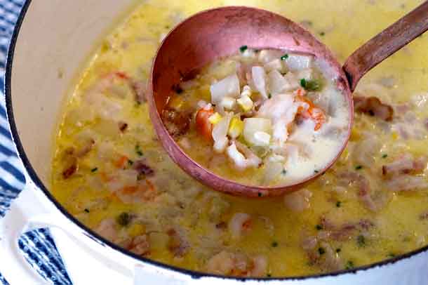Crab and Corn Chowder With Bourbon and Bacon. It takes just a shot of bourbon and a bit of bacon to spice up this traditional corn chowder, which is finished off with cooked shrimp, crab or lobster for a delicious and hearty summertime meal. Credit: Copyright 2016 della Croce & Hoyt/Forktales