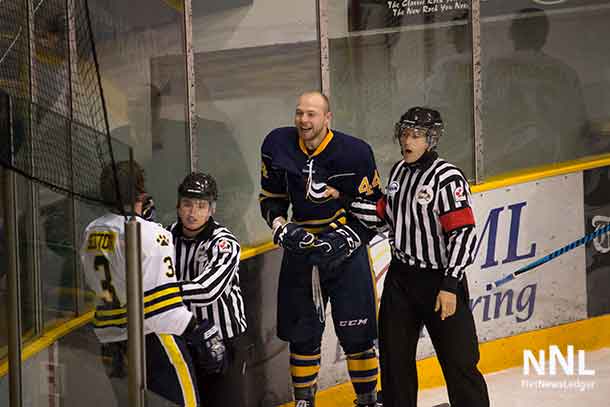 Tempers were flaring throughout the second and third periods. Here Pronghorn Ayrton Nikkel taunts the T-Wolves Player following a fight.