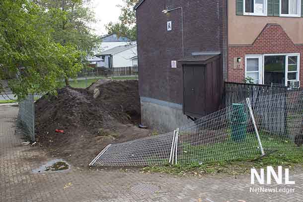 The fence surrounding the construction site was down for five days. After Mayor Hobbs visit the fence was put back up