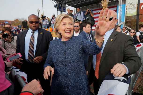 U.S. Democratic presidential nominee Hillary Clinton greets audience members at a campaign rally in Cedar Rapids, Iowa, U.S. October 28, 2016.  REUTERS/Brian Snyder