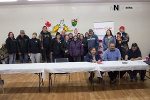 Community members in Fort Severn share smiles after signing of agreement