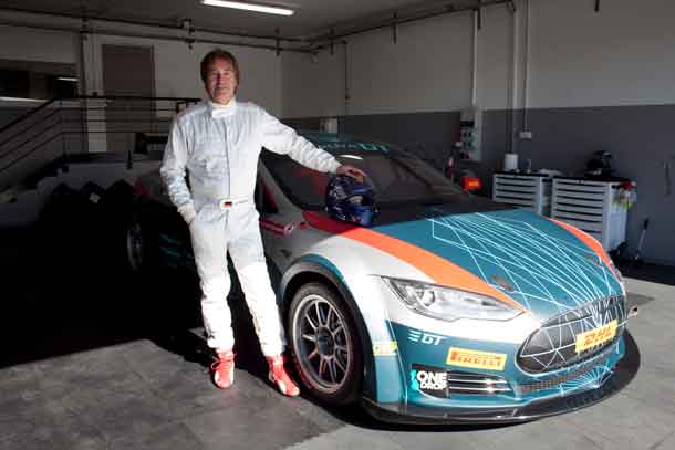 Heinz Harald Frentzen of Germany standing in front of a race version of a Tesla Model S P85+ after Frentzens race tests in Le Castellet, France, on 19-10-2016.