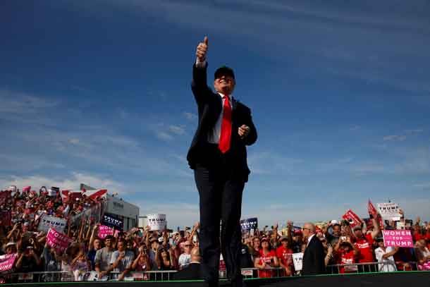 Donald Trump rallies with supporters at the Million Air Orlando airplane hangar in Sanford, Florida. REUTERS/Jonathan Ernst