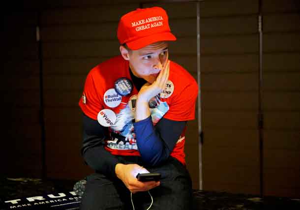 A Trump supporter waits for the Trump rally to begin at the Hilton Hotel during the U.S. presidential election in New York City, New York, U.S. November 8, 2016. REUTERS/Andrew Kelly