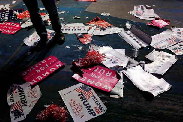 Debris and signs are left on the floor after the victory party for Republican president-elect Donald Trump New York, New York, U.S. November 9, 2016. REUTERS/Carlo Allegri