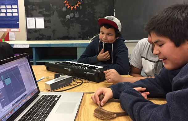 Marten Falls (Ogoki Post) youths engineer the song that youths created.
