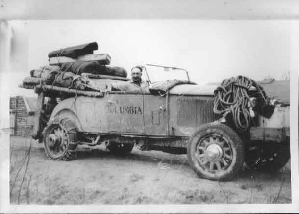 The McLaughlin-Buick arrives in Cameron Falls. Note the missing fenders and running boards, the ragtop, the heavy rope for winching, and the special rear-wheel hubs. Photo courtesy Nipigon Museum